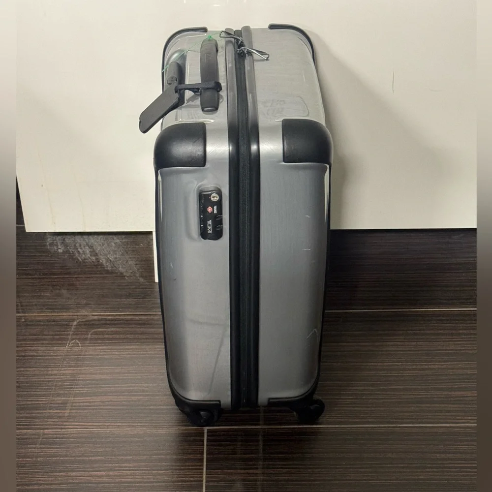 Tumi Vapor Silver and Black Hardside Spinner Carry-On